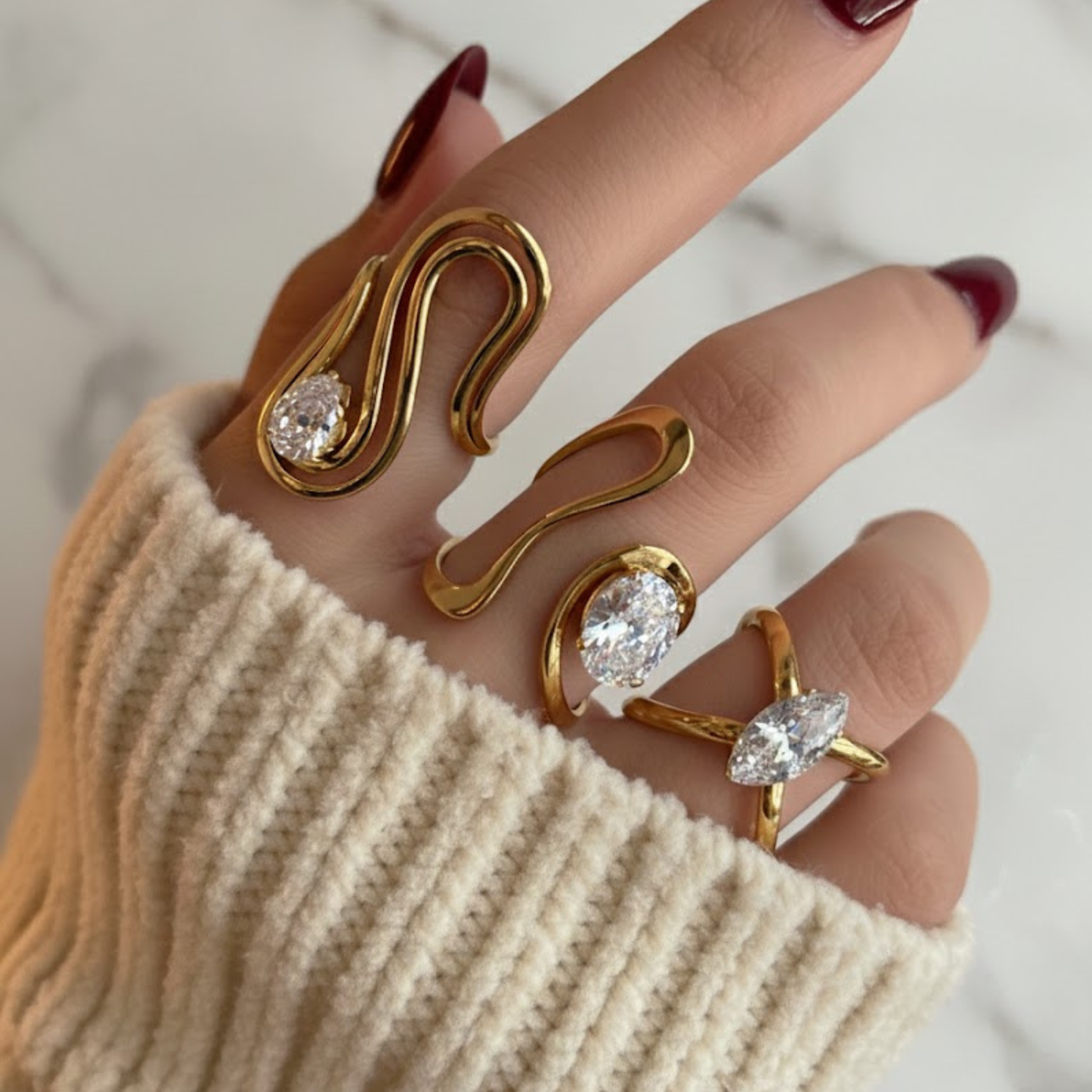 Elegant Wave Design Meets Everyday Luxury
The Gold Wave Ring features a stunning flowing wave design in radiant 18K gold plating over premium stainless steel. Adjustable sizing ensures the perfect fit