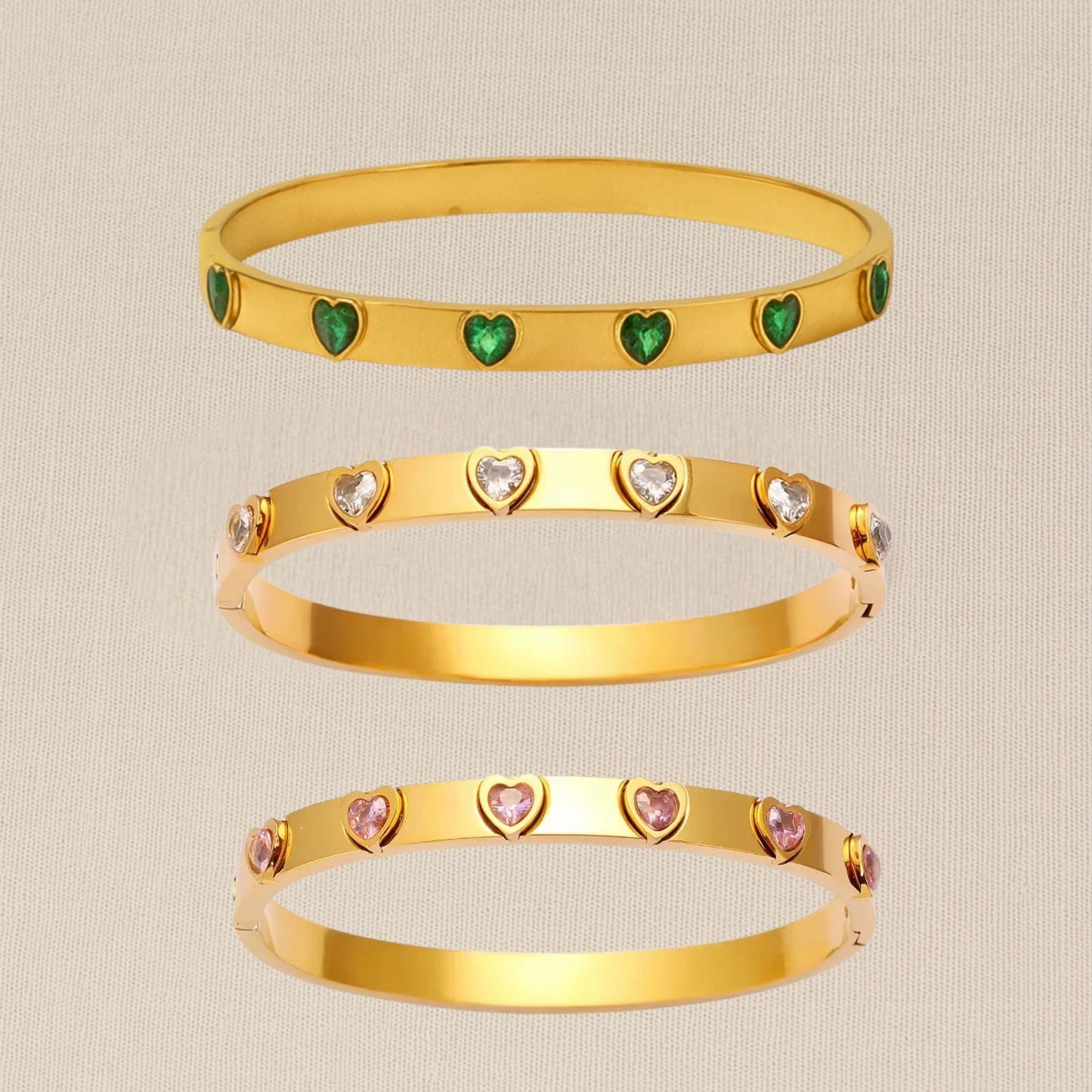 “CUORE 18k gold-plated stainless steel bracelet—waterproof, tarnish-free, hypoallergenic classic bangle on neutral background.”