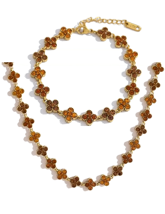 FLORAL BROWN GOLD PLATED NECKLACE AND BRACELET ON WHITE BACKGROUND