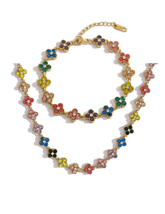 Multicolored floral necklace and bracelet on a white background