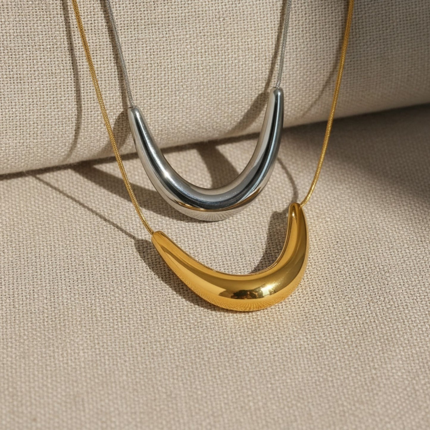 “Bella Luce 18k gold-plated stainless steel necklace—44.5 + 5 cm adjustable, waterproof, tarnish-free, hypoallergenic—on neutral background.”

