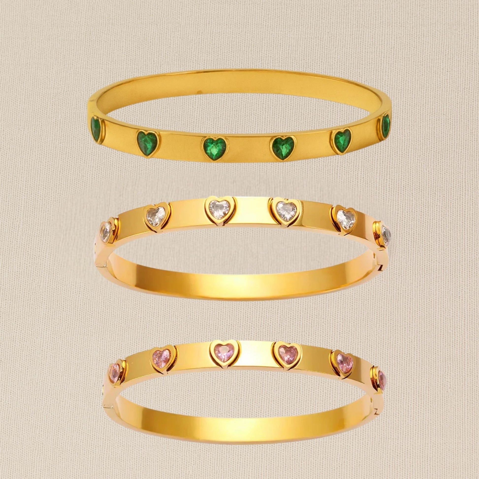“CUORE 18k gold-plated stainless steel bracelet—waterproof, tarnish-free, hypoallergenic classic bangle on neutral background.”