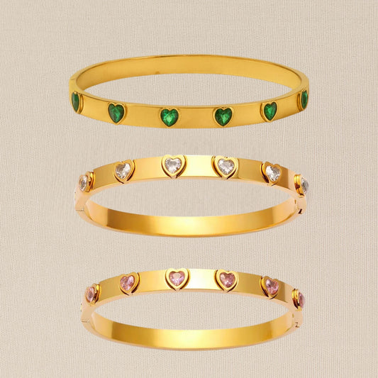 “CUORE 18k gold-plated stainless steel bracelet—waterproof, tarnish-free, hypoallergenic classic bangle on neutral background.”